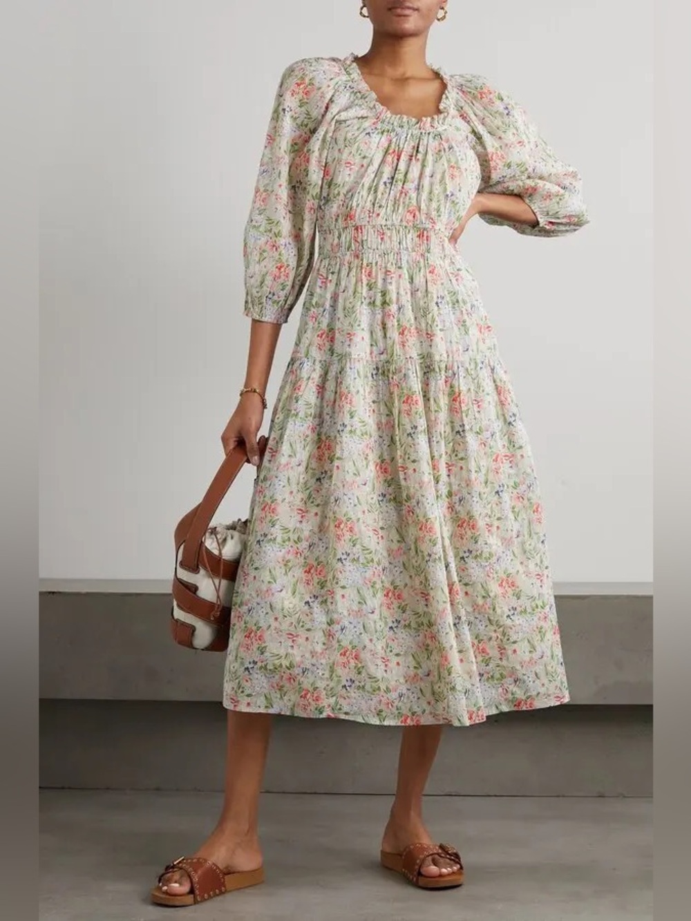 The great. The Moonstone Midi Dress fits size 6 NWOT